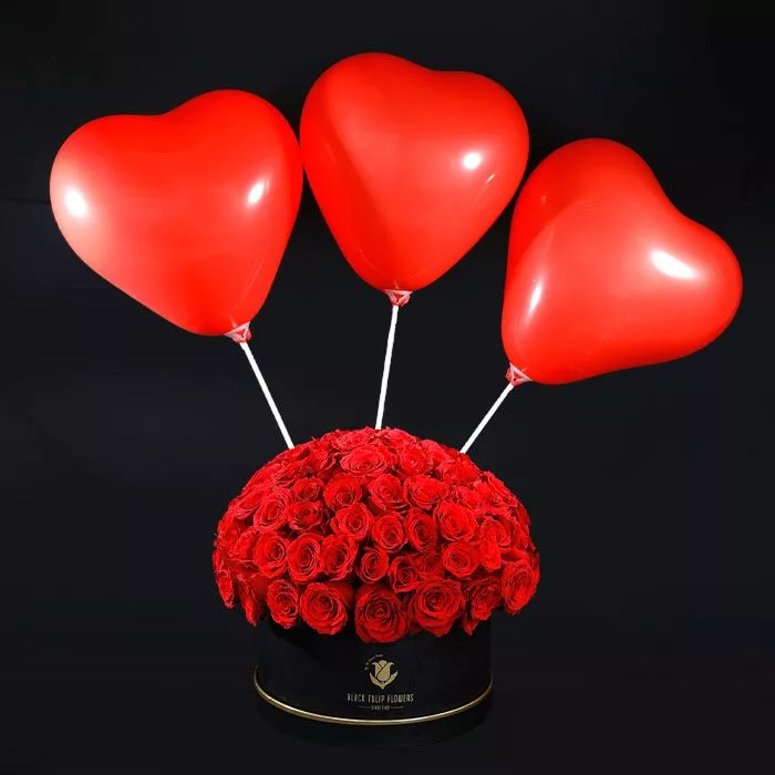 box of red roses with balloons jpg