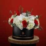 enchanting_red_and_white_flowers_in_a_box_1.png