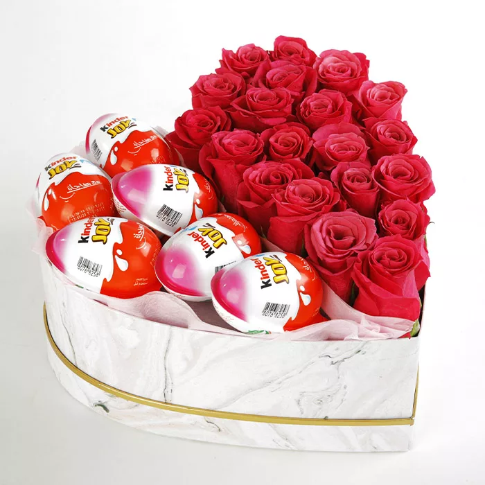 heart shape box of pink roses and kinder joy jpg