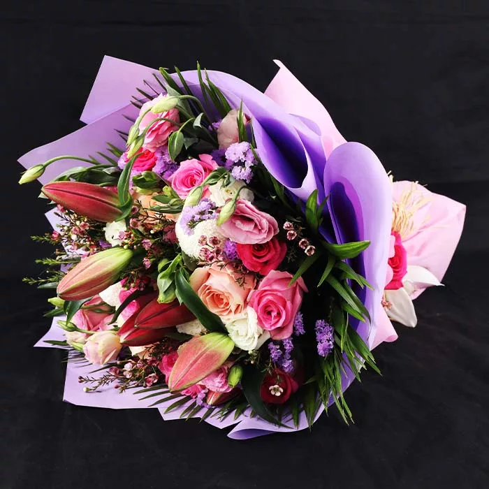 mix flowers in purple wrapping jpg