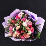 mix_flowers_in_purple_wrapping_2_.jpg