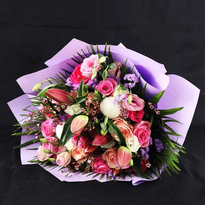 mix flowers in purple wrapping 2 jpg