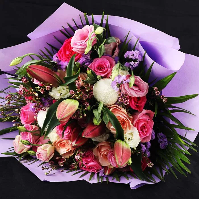 mix flowers in purple wrapping 3 jpg