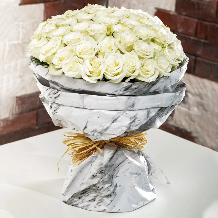 white roses in marbled wrapping jpg