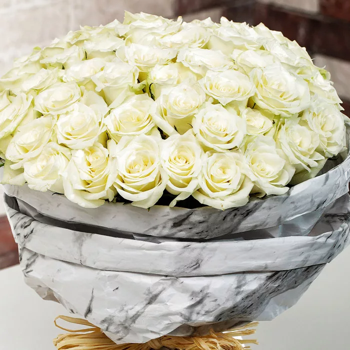 white roses in marbled wrapping 2 jpg