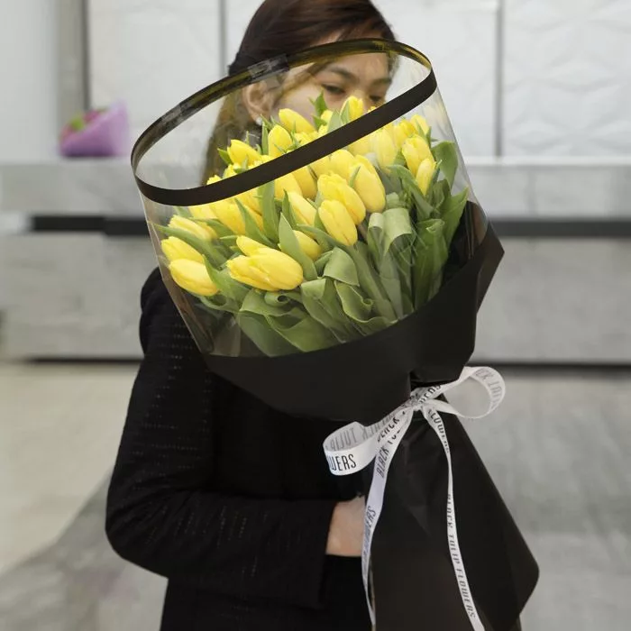 yellow tulips in black wrap 1 jpg