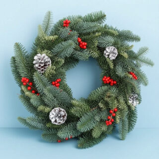 Classic Christmas wreath showcasing seasonal elegance, ideal for enhancing your space and welcoming the holiday spirit.
