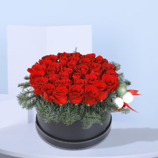 A Christmas Edition box containing 30-35 red roses, beautifully arranged to convey elegance and joy during the holiday season.