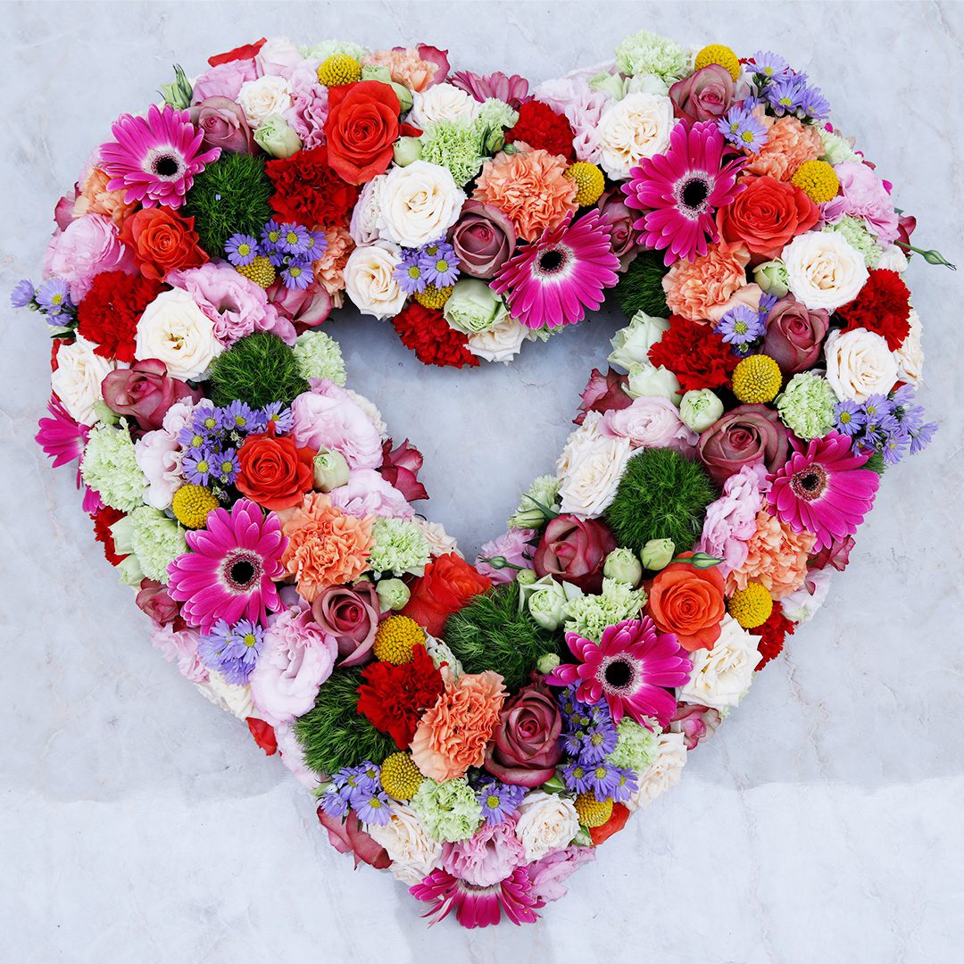 Assorted Heart flower arrangement by Black Tulip Flowers