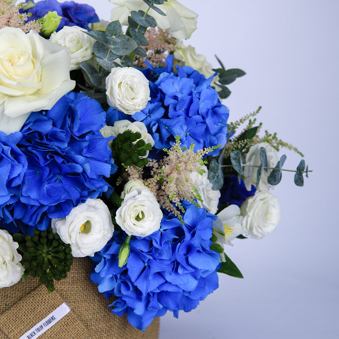 Azure and Ivory flower box by Black Tulip Flowers.