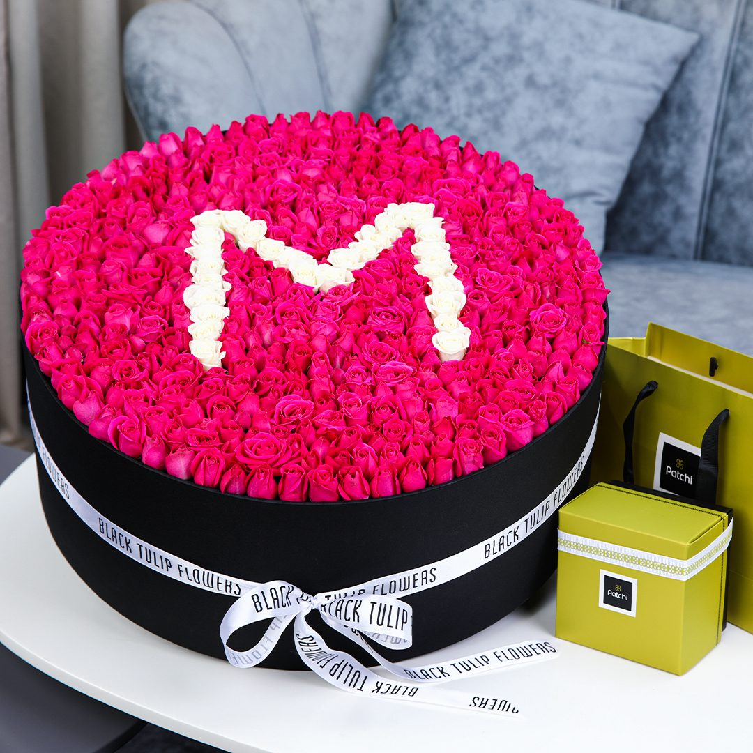 Marvelous Round Arrangement with Patchi Chocolate by Black Tulip Flowers