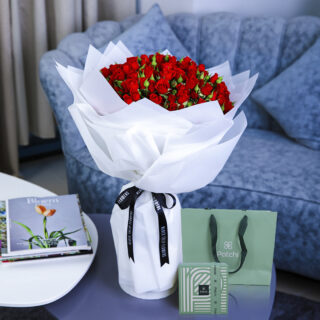 red rose hand bouquet with patchi chocoaltes delivery in dubai