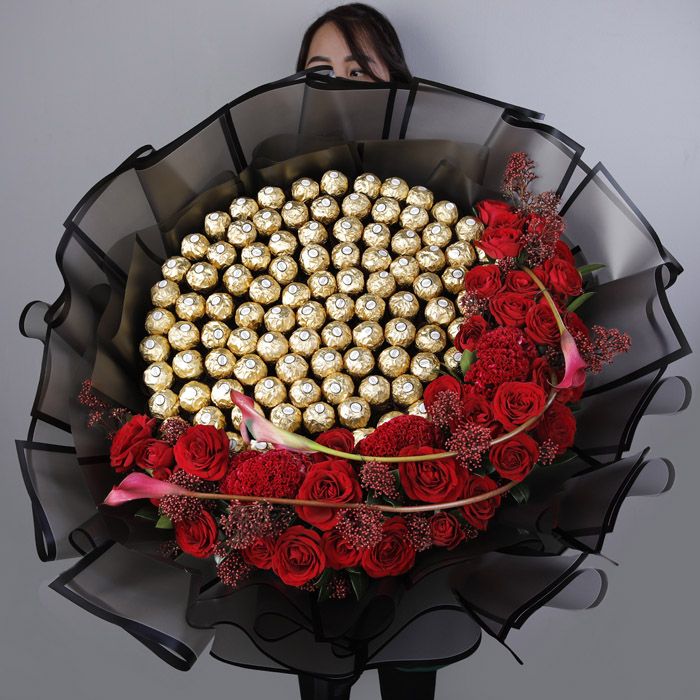 ferrero bouquet with red flowers