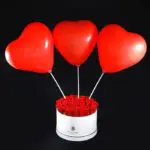 red_roses_in_white_box_with_balloons