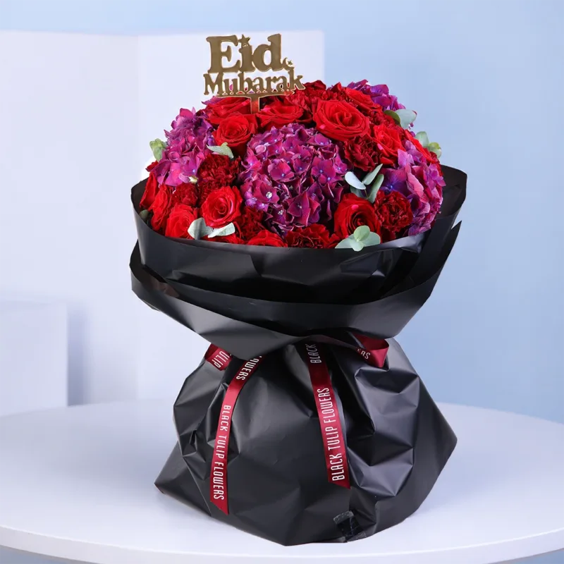A vibrant bouquet for Eid al-Fitr featuring 25 red roses and 20 red carnations, symbolizing love, joy, and gratitude.