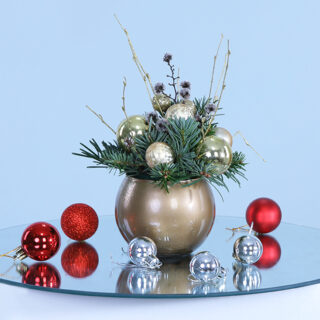 Christmas vase featuring vibrant holiday blooms, creating a warm and joyful centerpiece for your festive gatherings.