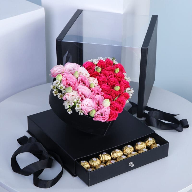 01 Lisianthus and Baby Roses in a heart-shaped arrangement in a box with a draw filled with Ferrero Rocher chocolates.