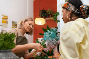 florist carefully arranging a vibrant bouquet of flowers following a customer's specific request.