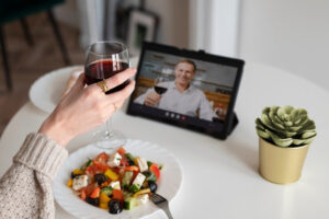 A Must-Have Valentine's Day Guide 2025: Everything You Need 12 A virtual couple enjoying a romantic dinner with wine