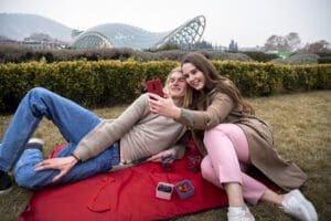 Gen Z young couple taking selfies