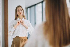 15+ Best Ways to Spend Valentine's Day As Single (Truly Practical) 3 pretty-young-woman-casual-outfit-looking-into-mirror
