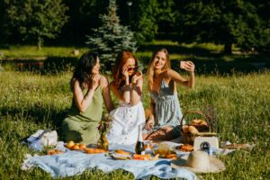 15+ Best Ways to Spend Valentine's Day As Single (Truly Practical) 2 A group of friends gathered together, enjoying a fun-filled Singles' Day celebration. They are laughing, eating, and drinking, surrounded by decorations and party favors.