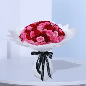 This Hand Bouquet Composed with Mix of 100 stems Red and Pink Roses.