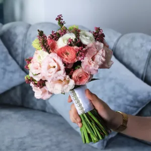 Capture the essence of your special day with our momentous bridal bouquet, a breathtaking arrangement that adds a touch of elegance and romance to every step down the aisle.