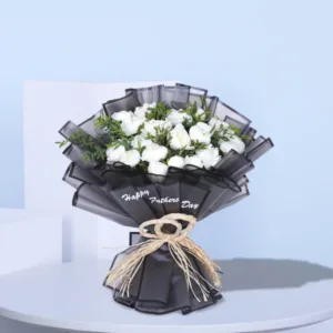 Surprise Dad with a stunning arrangement of 20 stem white peonies elegantly wrapped in black, accompanied by lush green leaves. Make this Father’s Day unforgettable with a gift as timeless and beautiful as his love.