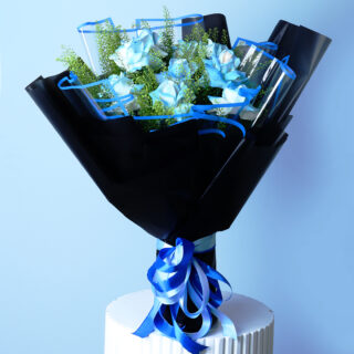 double color blue painted rose with thalapsi leaves