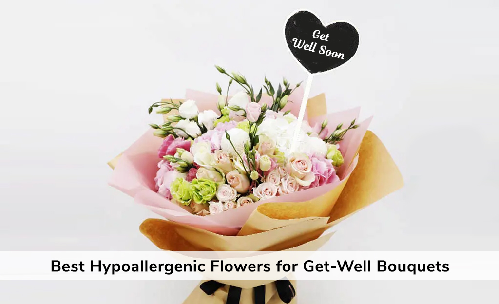 Soft pastel bouquet of roses, peonies, tulips, hydrangeas, and snapdragons wrapped in kraft paper, topped with a small “Get Well Soon” heart pick.