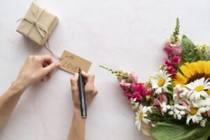 top view flowers bouquet with gift