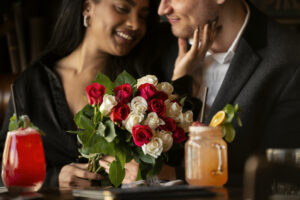 young woman having bouquet roses from her boyfriend