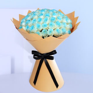 Bouquet of white roses with blue painted edges, wrapped in brown and tied with a black ribbon.