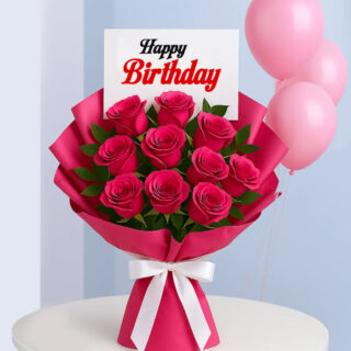 Flower Delivery Abu Dhabi 31 A bouquet of pink roses with a "Happy Birthday" card with three pink balloons in the background.