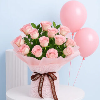 Flower Delivery Abu Dhabi 32 A beautiful bouquet of light pink roses with green leaves, wrapped in light pink, tied with a brown ribbon with three helium-filled pink balloons.