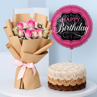 A birthday gift featuring a bouquet of 5 pink roses wrapped in brown with a pink ribbon, a round pink "Happy Birthday" balloon with black and white script, and a round cake.