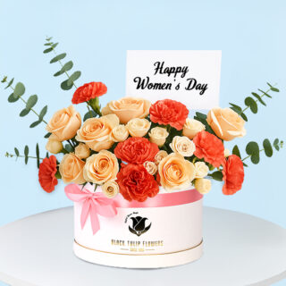 A beautifully wrapped gift box adorned with a "Happy Women's Day" tag, surrounded by flowers and decorative elements.