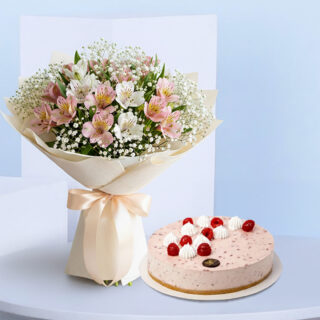 A pink and white alstroemeria flower bouquet with baby's breath, tied with a light pink ribbon and a round raspberry cheesecake topped with fresh raspberries and white whipped cream.