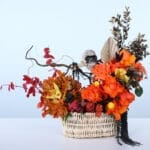 halloween-basket-arrangement-with-roses-and-orchids-01-10-25