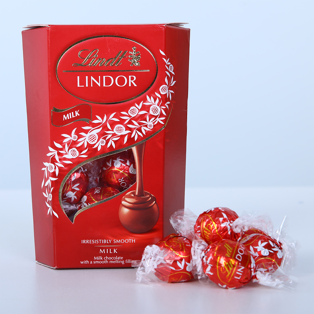 lindor-milk-chocolate-01-10 Lindt Lindor milk chocolate 200g box with red truffles.