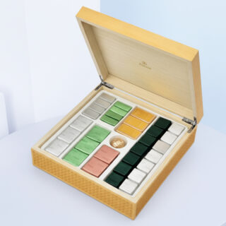Luxury assorted Patchi milk chocolate gift box with 68 pieces in wooden packaging.