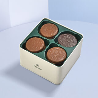 Patchi chocolate cookies box with dark, lemon, and praline cookies coated in milk and dark chocolate.