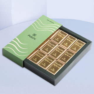 Patchi golden milk chocolate box with gianduja filling in elegant packaging.