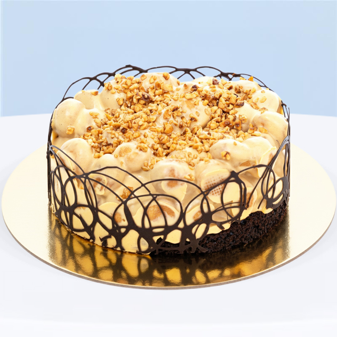 caremella-chocolate-cake Caramella Cake 0.5 Kg by Katrina Sweets & Confectionery with caramelized hazelnuts on a chocolate moist base
