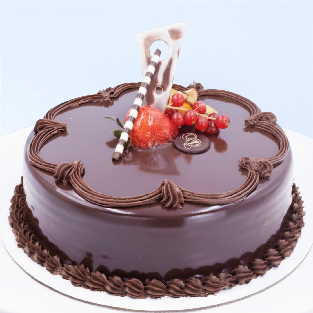 chocolate-truffle-cake Chocolate Truffle Cake 1 Kg by Mister Baker topped with strawberry, berries, and chocolate garnish