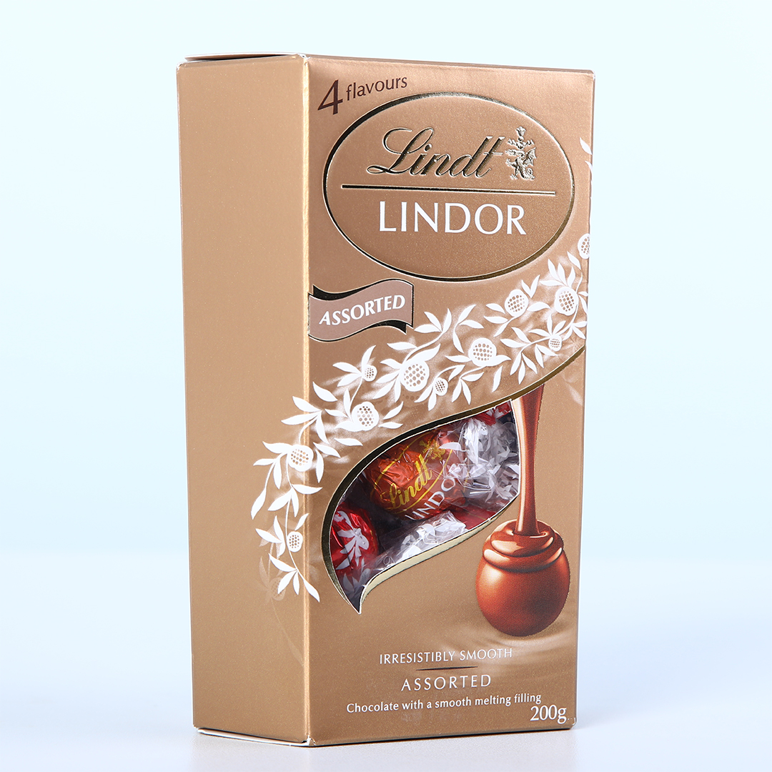 lindor-truffles-gold-box Lindt Lindor Assorted Chocolate Truffles 200g Gold Box with assorted wrapped chocolates.