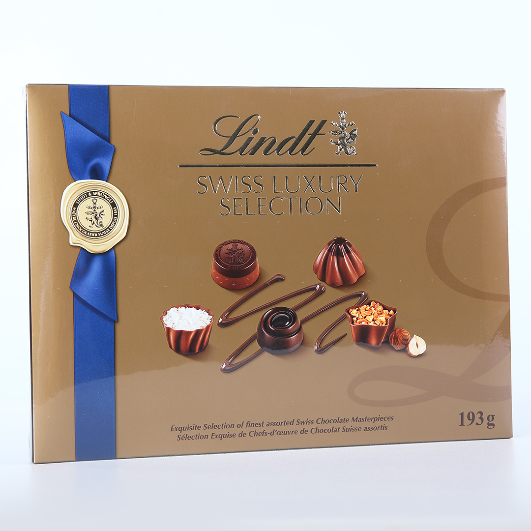 lindt-luxury-chocolates Lindt Swiss Luxury Selection 193g box of assorted Swiss chocolates with blue ribbon and gold packaging.
