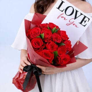 BTF Home 17 Bouquet featuring red roses with green leaf accents in premium red wrapping, finished with a LOVE message card.