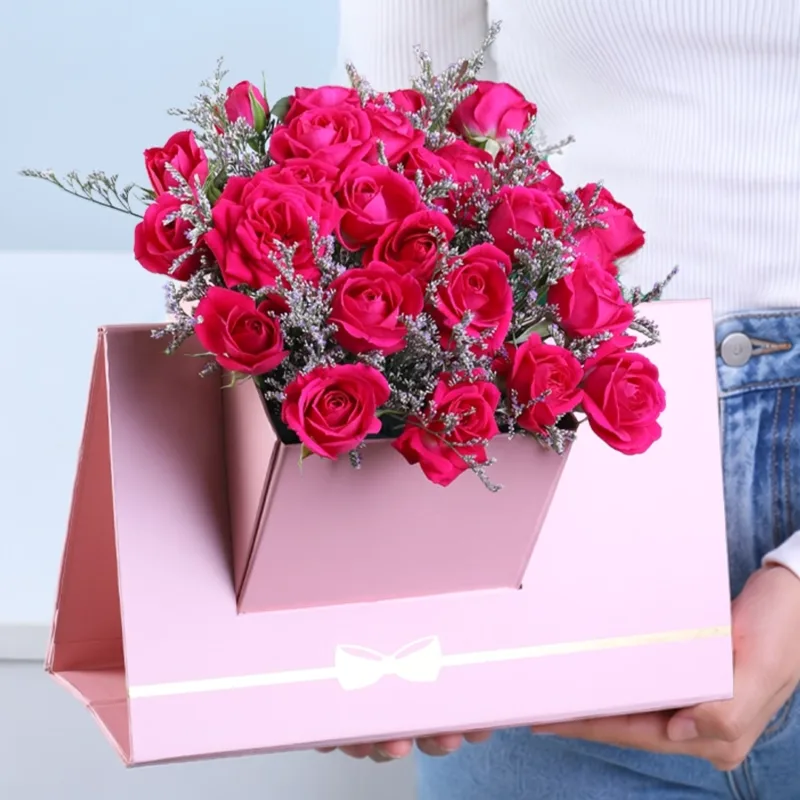 dark-pink-spray-rose-envelope-box Dark Pink Spray Rose Envelope Box featuring 6 stems of fresh dark pink spray roses with delicate caspia arranged in a premium pink envelope-style flower box for gifting and special occasions.